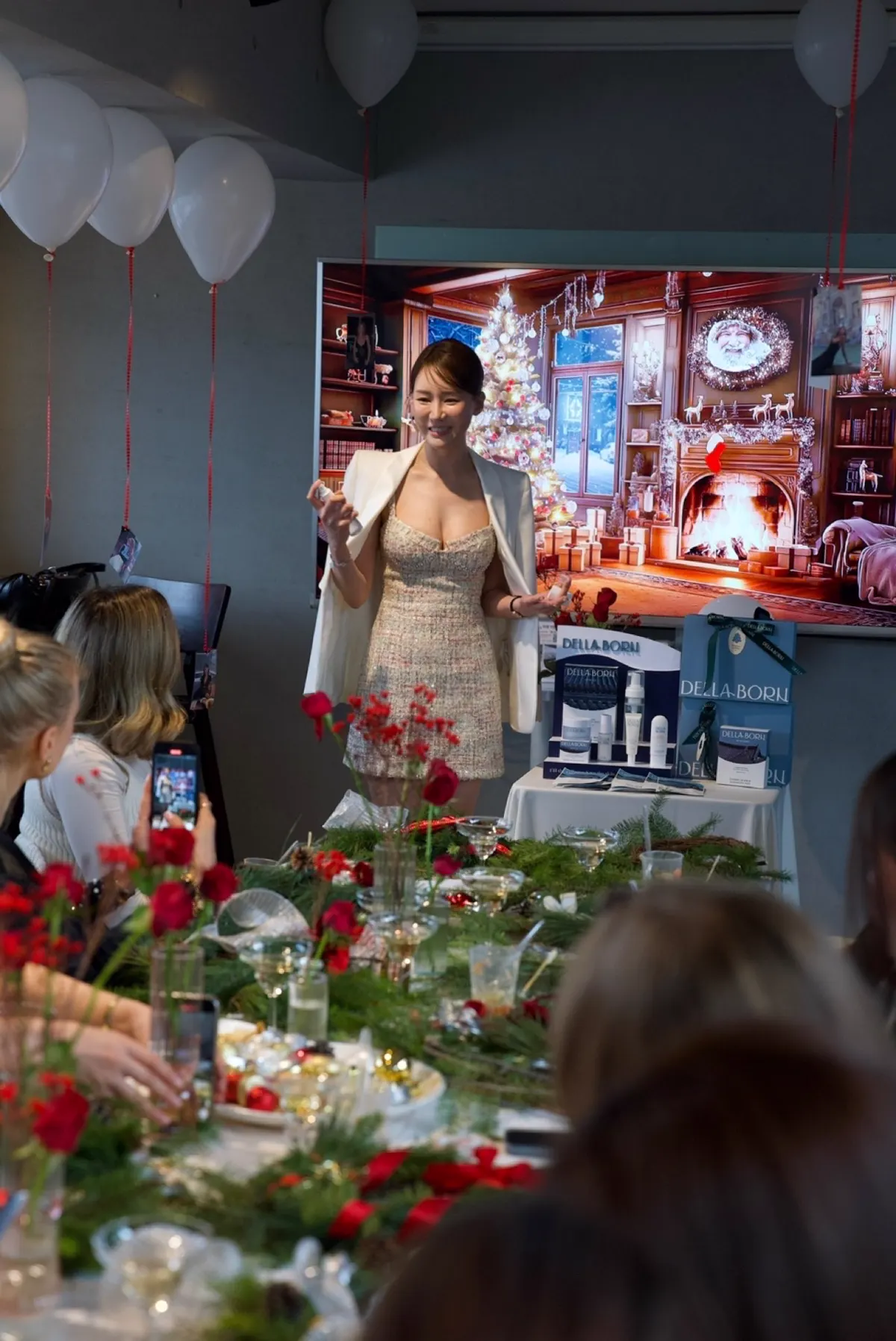Host presenting Korean beauty products