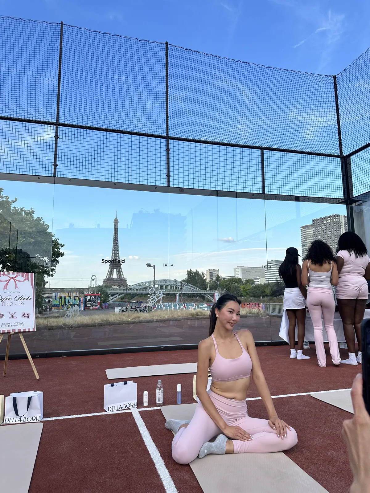 Pilates instructor leading a rooftop session